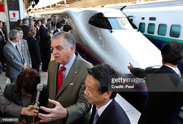 Transportation Secretary Ray LaHood speaks to reporters with Satoshi Seino , president of East Japan Railway Co., one of the country's major train...