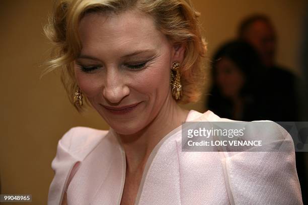 Australian actress Cate Blanchett leaves after the press conference of "Robin Hood" presented out of competition at the 63rd Cannes Film Festival on...