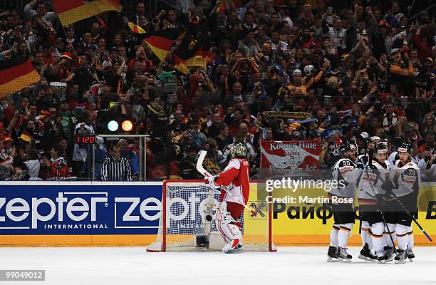 The team of Germany celebrates after scoring their team's first goal during the IIHF World Championship group A match between Denmark and Germany at...