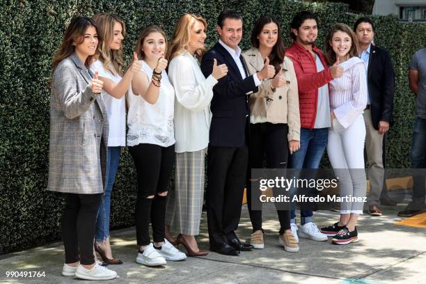 President Enrique Peña Nieto poses with her wife Angélica Rivera and his family after casting their votes during the 2018 Presidential Elections at...