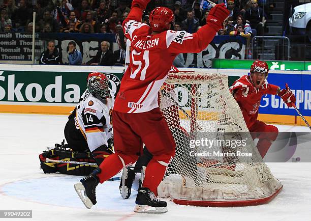 Morten Madsen of Denmark celebrates after scoring his team's opening goal during the IIHF World Championship group A match between Denmark and...