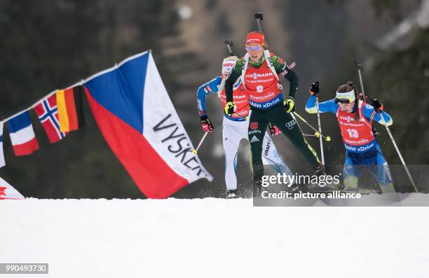 Kaisa Maekaeraeinen of Finland , Laura Dahlmeier of Germany and Darya Domracheva of Belarus in action during the women's mass start event of the...