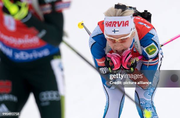 Kaisa Maekaeraeinen of Finland and Laura Dahlmeier of Germany in action during the women's mass start event of the Biathlon World Cup at the Chiemgau...