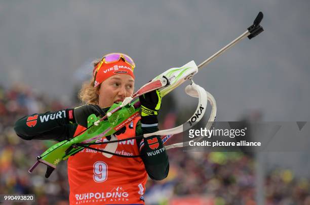 Laura Dahlmeier of Germany at the shooting range during the women's mass start event of the Biathlon World Cup at the Chiemgau Arena in Ruhpolding,...