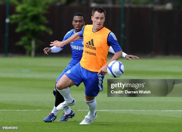 John Terry and Daniel Sturridge of Chelsea during training today at the Cobham Training ground on May 12, 2010 in Cobham, England.