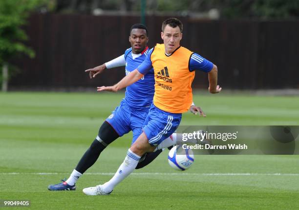 John Terry and Daniel Sturridge of Chelsea during training today at the Cobham Training ground on May 12, 2010 in Cobham, England.