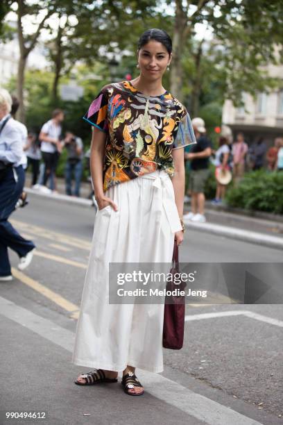 Caroline Issa wears a Dior top during Couture Fall 2018 Fashion Week on July 2, 2018 in Paris, France.