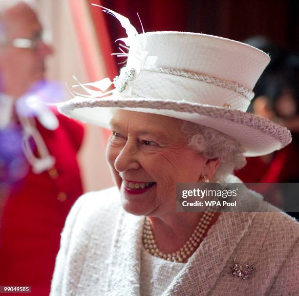 Queen Elizabeth II visits the Company of Pikemen and Musketeers at HAC Armoury House on May 12, 2010 in London, England.