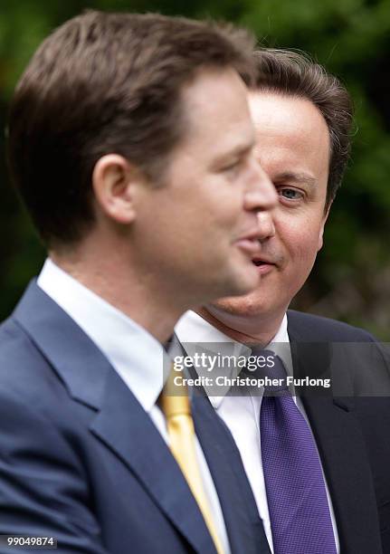 Prime Minister David Cameron and Deputy Prime Minister Nick Clegg hold their first joint press conference in the Downing Street garden on May 12,...