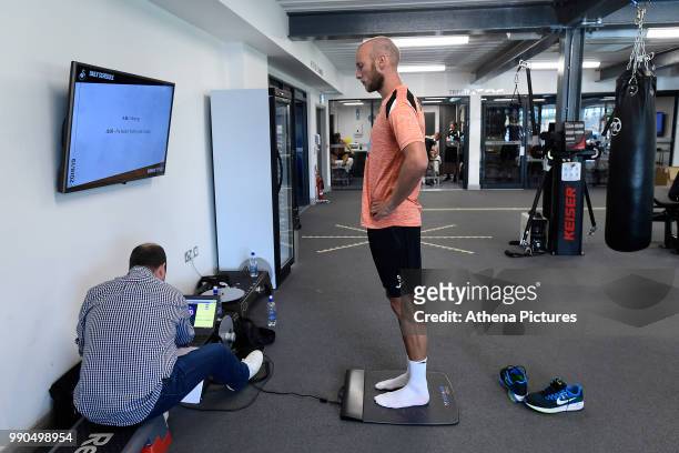 Mike van der Hoorn is weighed during the Swansea City Players Return to Pre-Season Training at The Fairwood Training Ground on July 02, 2018 in...
