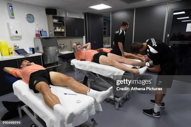 Federico Fernandez and Alfie Mawson are assessed during the Swansea City Players Return to Pre-Season Training at The Fairwood Training Ground on...