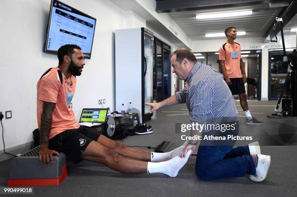 Kyle Bartley is assessed during the Swansea City Players Return to Pre-Season Training at The Fairwood Training Ground on July 02, 2018 in Swansea,...