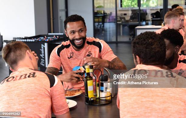 Kyle Bartley has lunch with team mates during the Swansea City Players Return to Pre-Season Training at The Fairwood Training Ground on July 02, 2018...