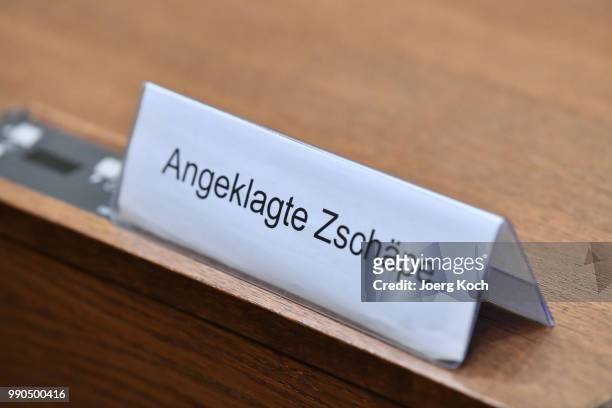 Sign of defendant Beate Zschaepe, seen during the start of the 437th day of trial on terror charges in connection with the neo-Nazi NSU group at the...