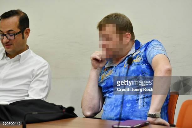 Co-defendant Holger G. Waits for the start of the 437th day of their trial on terror charges in connection with the neo-Nazi NSU group at the...