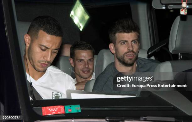 Thiago Alcantara, Cesar Azpilicueta and Gerard Pique arrive at Barajas Adolfo Suarez international airport on July 2, 2018 in Madrid, Spain.