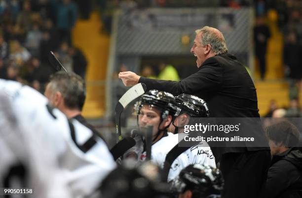 Nuernberg coach Rob Wilson gestures during the DEL ice hockey match between EHC Red Bull Muenchen and Nuernberg Ice Tigers at the...