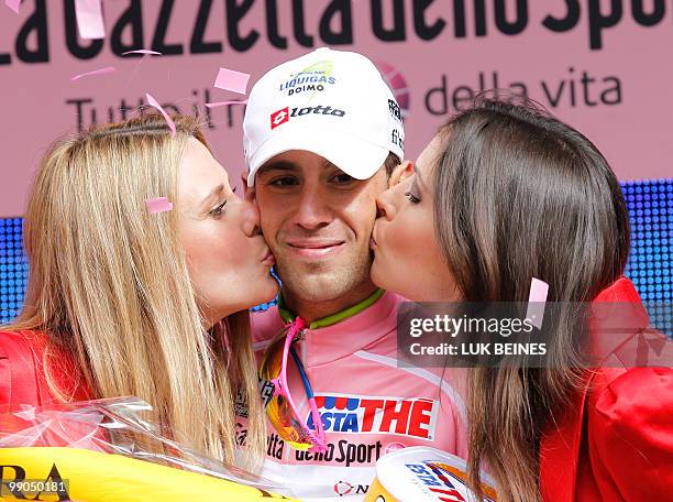 Italia's Vincenzo Nibali of the Liquigas-Doimo team celebrates on the podium after winning the fourth stage of the 93rd Giro d'Italia, in Cuneo on...