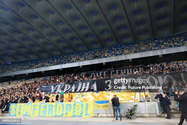 Activists occupy the stands during the Oleh, Ukraina z toboiu! action held in support of Ukrainian filmmaker Oleh Sentsov who is serving an illegal...