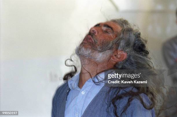 Kasnazani dervish transcends with his long hair loose in the air, during a Remembrence ceremony in a Tekieh in Najar village near Sanandaj in Iran's...