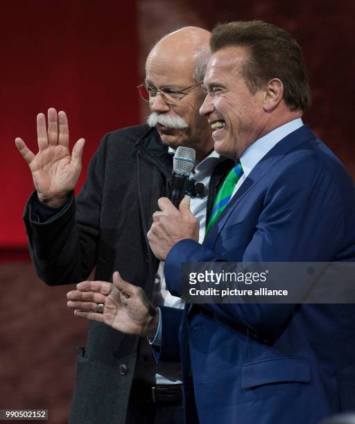 Of Mercedes Dieter Zetsche and Arnold Schwarzenegger jointly present the new G-class at the Michigan Theatre of Detroit, US, 15 January 2018. The...