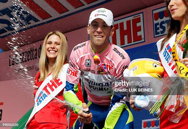 Italia's Vincenzo Nibali of the Liquigas-Doimo team celebrates his on the podium after winning the fourth stage of the 93rd Giro d'Italia, in Cuneo...