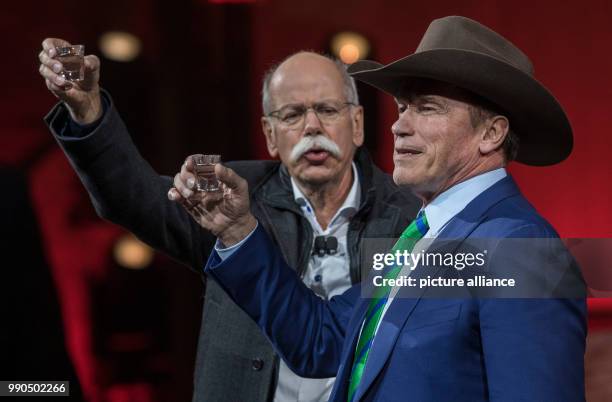 Of Mercedes Dieter Zetsche and Arnold Schwarzenegger jointly present the new G-class at the Michigan Theatre of Detroit, US, 15 January 2018. The...