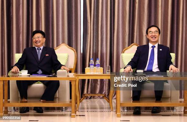 South Korean Unification Minister Cho Myoung-gyon talks with North Korean Vice Sports Minister Won Kil-u during their meeting at Pyongyang Sunan...