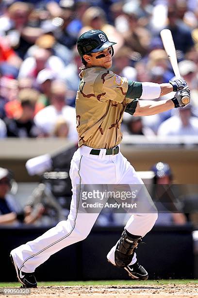 Lance Zawadzki of the San Diego Padres gets his first hit in his first major league at bat against the Milwaukee Brewers at Petco Park on Sunday, May...