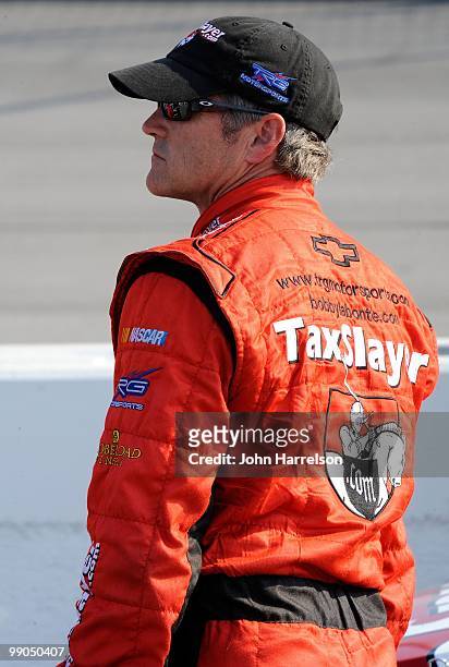Bobby Labonte, driver of the TaxSlayer.com Chevrolet, looks on during qualifying for the NASCAR Sprint Cup Series SHOWTIME Southern 500 at Darlington...