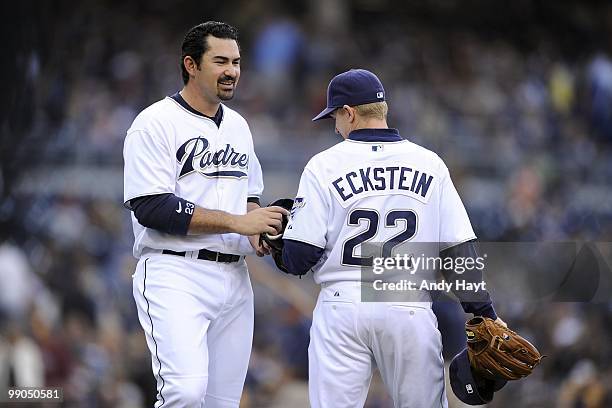 Adrian Gonzalez and David Eckstein of the San Diego Padres talk between innings against the Milwaukee Brewers at Petco Park on Saturday, May 1, 2010...