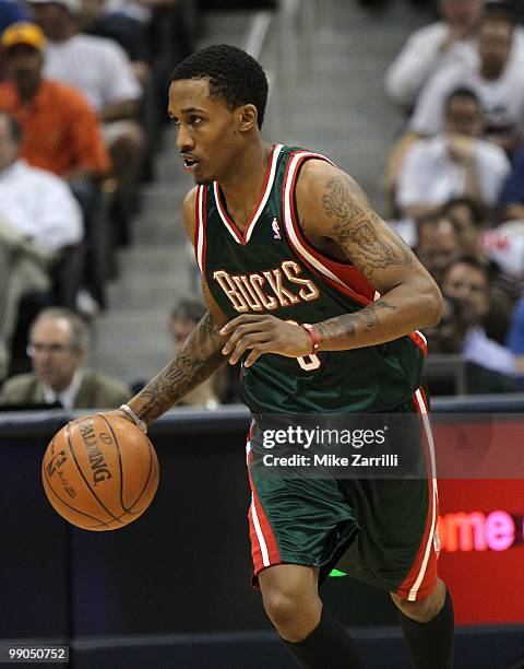 Guard Brandon Jennings of the Milwaukee Bucks dribbles with the ball during Game Seven of the Eastern Conference Quarterfinals between the Milwaukee...