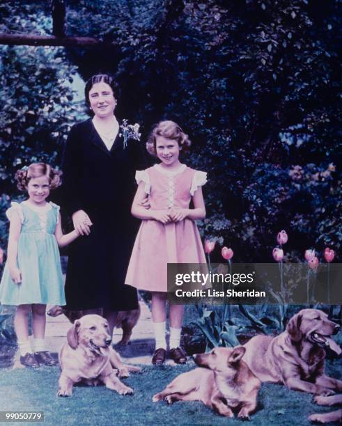 The Queen Mother as Duchess of York, with Princess Margaret and Princess Elizabeth at the Royal Lodge in Windsor in England, circa June 1936.