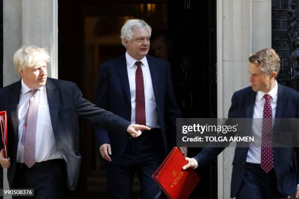 Britain's Foreign Secretary Boris Johnson , Britain's Secretary of State for Exiting the European Union David Davis and Britain's Defence Secretary...