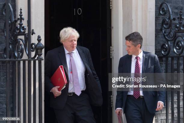 Foreign Secretary Boris Johnson and Defence Secretary Gavin Williamson leaving Downing Street, London, after attending a Cabinet meeting.