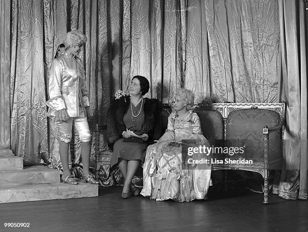 Princess Elizabeth dressed as Prince Charming with Queen Elizabeth, The Queen Mother and Princess Margaret as Cinderella during a royal pantomime at...