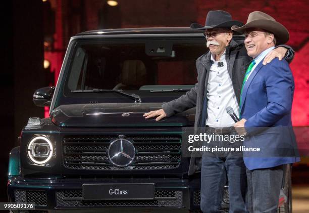 Of Mercedes Dieter Zetsche and Arnold Schwarzenegger jointly present the new G-class at the Michigan Theatre of Detroit, US, 14 January 2018. The...
