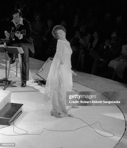 African American singer Lena Horne , performs on stage at The London House, a jazz club and restaurant located at the corner of Michigan Avenue and...