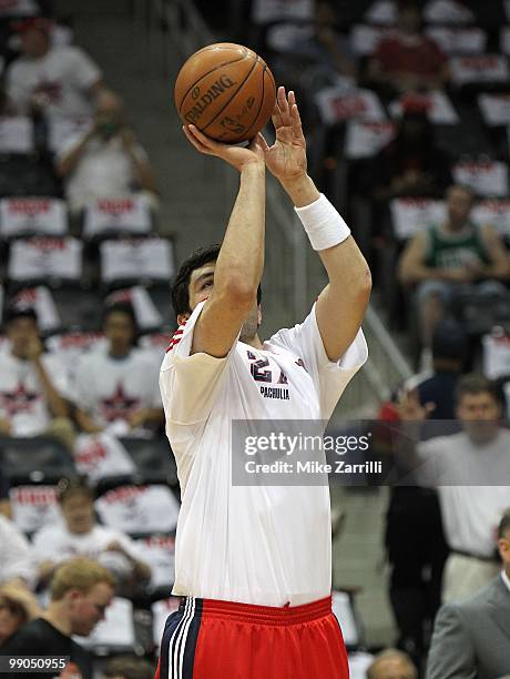 Center Zaza Pachulia of the Atlanta Hawks shoots a practice shot before Game Seven of the Eastern Conference Quarterfinals between the Milwaukee...