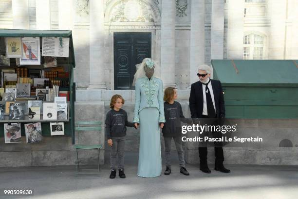 Karl Lagerfeld greets the audience on the runway during the Chanel Haute Couture Fall Winter 2018/2019 show as part of Paris Fashion Week on July 3,...