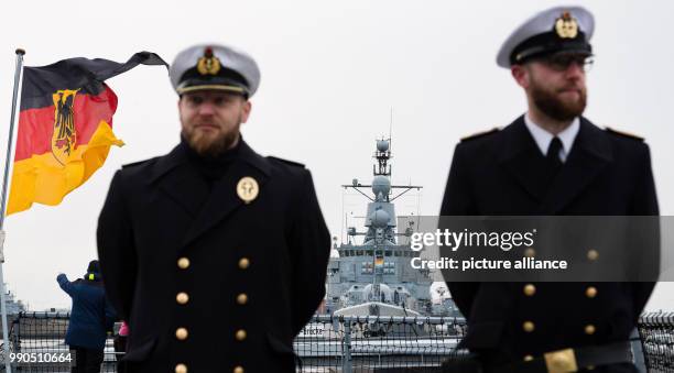 Two marine soldiers stand on board the marine ship "Hessen" at the naval base in Wilhelmshaven, Germany, 15 January 2018. The frigate "Hessen" will...