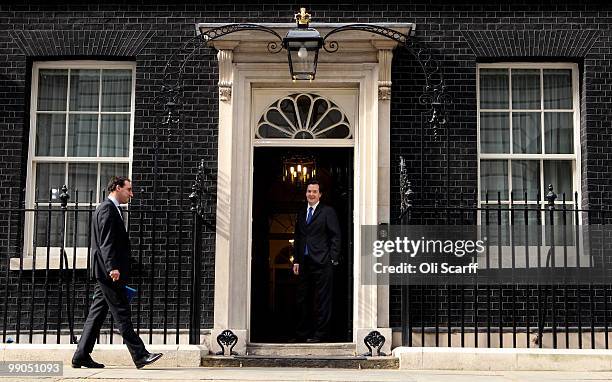 Chancellor of the Exchequer George Osborne arrives at Number 10 Downing Street on May 12, 2010 in London, England. After five days of negotiation a...