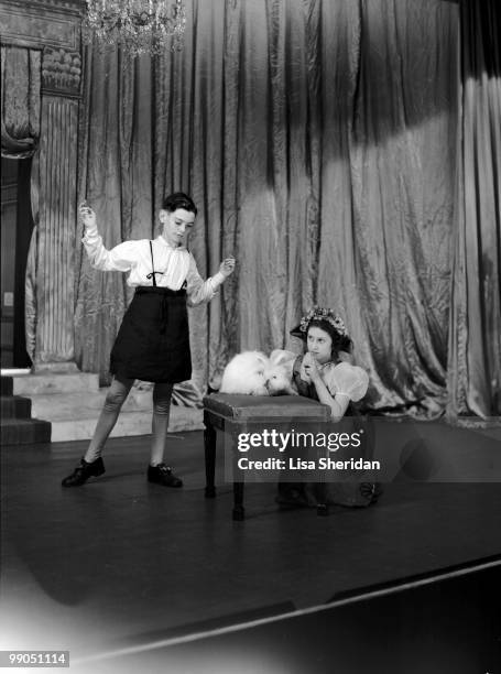 Scene during a royal pantomime at Windsor Castle with Princess Elizabeth as Prince Charming, and Princess Margaret as Cinderella, Berkshire, Great...