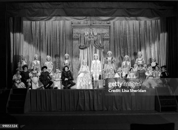Princess Margaret dressed as Cinderella, with Princess Elizabeth dressed as Prince Charming during a royal pantomime at Windsor Castle, Berkshire,...
