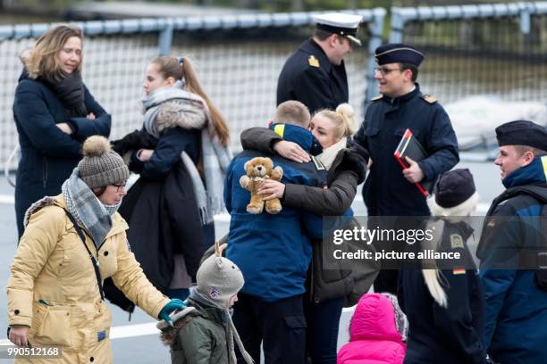 Marine soldiers say goodbye to their families on board the marine ship "Hessen" at the naval base in Wilhelmshaven, Germany, 15 January 2018. The...