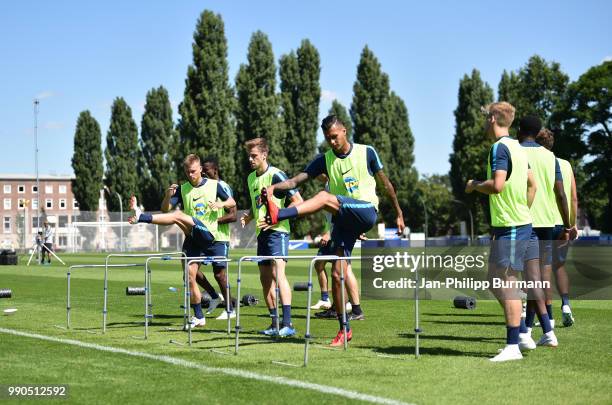 Maximilian Mittelstaedt, Lukas Kluenter and Davie Selke of Hertha BSC in action during a training session at the Schenkendorfplatz on July 3, 2018 in...