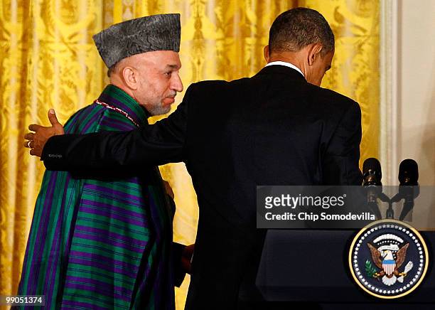 President Barack Obama and Afghanistan President Hamid Karzai leave a joint news conference in the East Room of the White House May 12, 2010 in...