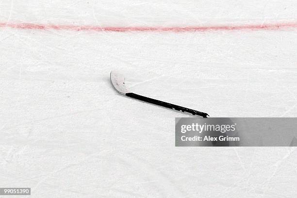 The blade of a hockey stick lies on the ice during the IIHF World Championship group C match between Italy and Latvia at SAP Arena on May 12, 2010 in...