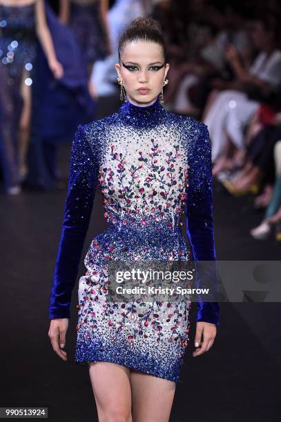 Model walks the runway during the George Hobeika Haute Couture Fall Winter 2018/2019 show as part of Paris Fashion Week on July 2, 2018 in Paris,...