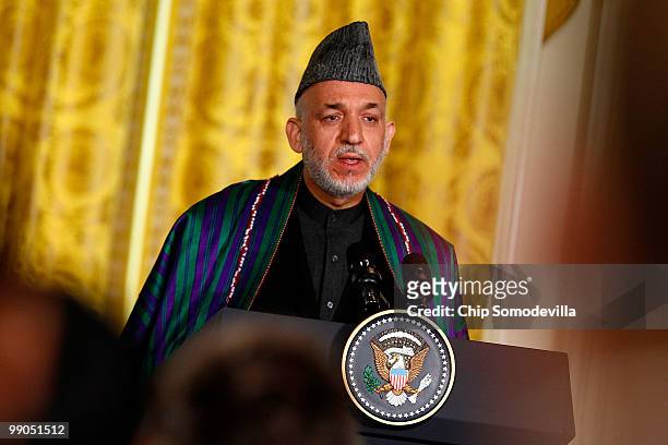 Afghanistan President Hamid Karzai speaks during a joint news conference with U.S. President Barack Obama in the East Room of the White House May 12,...